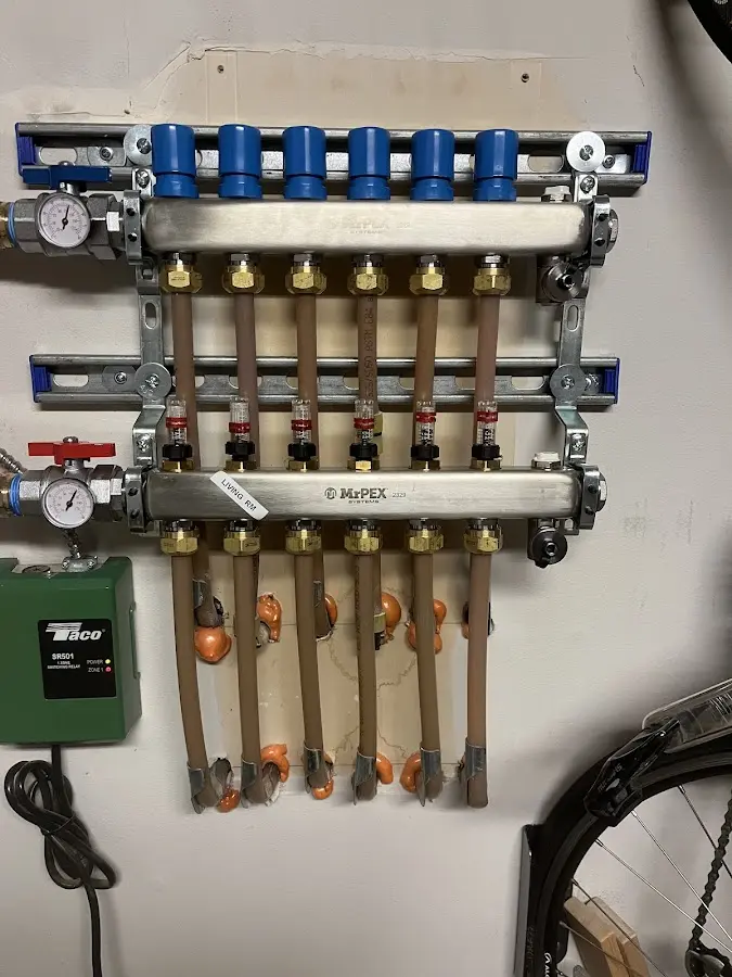 Plumber performing Water Heater Repair at a residential property in Tiffin